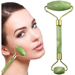 jade face roller on white background