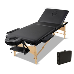 Folded wooden massage table