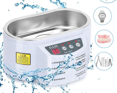 Compact ultrasonic cleaning device